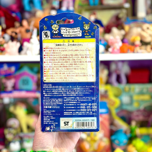 Tamagotchi Gen 1 - White Shell with Twirls Japanese (1997, Bandai) - PopCultGang