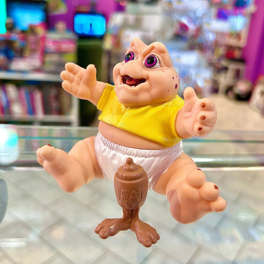 Jim Henson’s Dinosaurs: Baby Sinclair + Meat Bottle (Disney, 90s) - PopCultGang