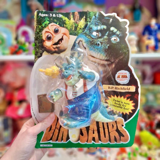 Jim Henson’s Dinosaurs: B.P. Richfield Action Figure (MOC, Disney, 90s) - PopCultGang