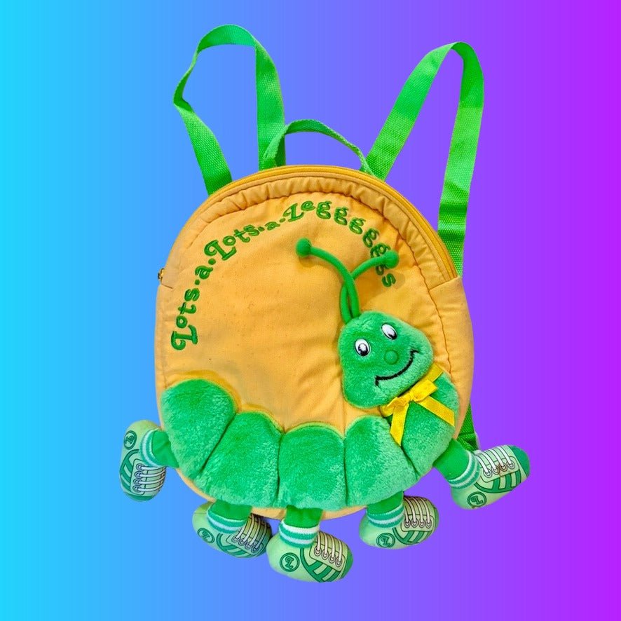 Lots - A - Lots - A - Leggggggs: Yellow Backpack Green Caterpillar (90s) - PopCultGang
