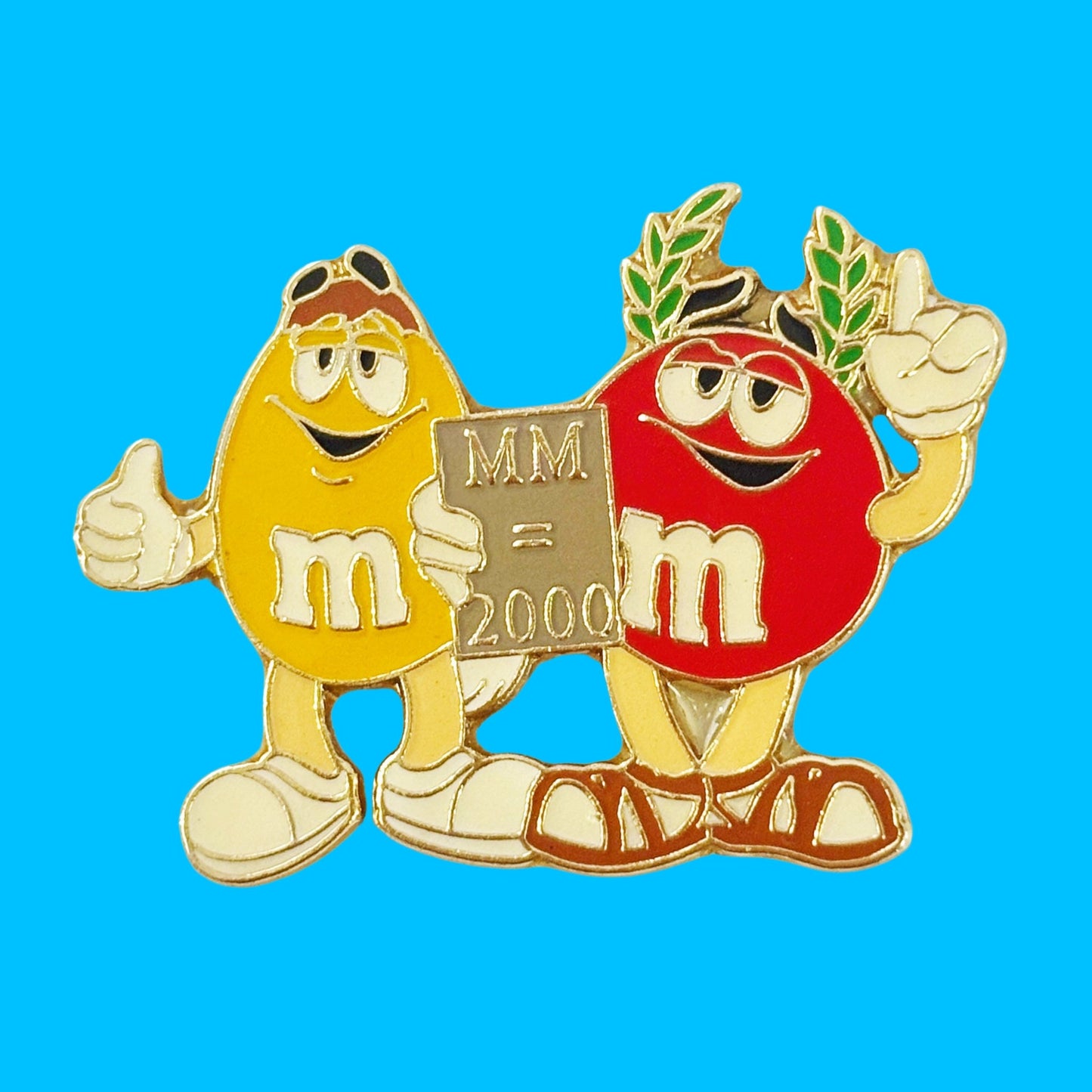 M&Ms: Y2K Roman Numerals Enamel Pin (2000) - PopCultGang