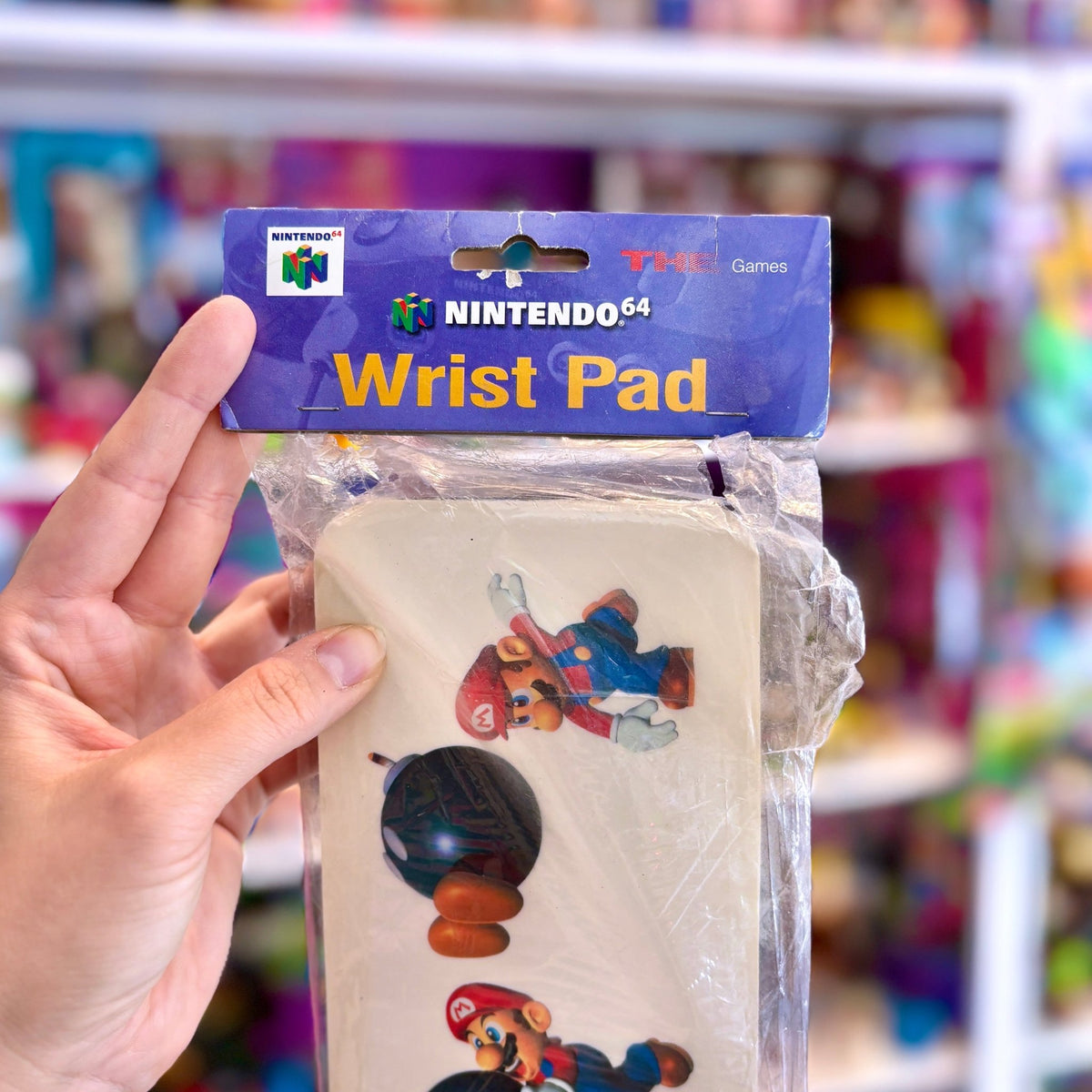 Nintendo 64 Wrist Pad - Mario Throwing Bob-Omb (90s) - PopCultGang