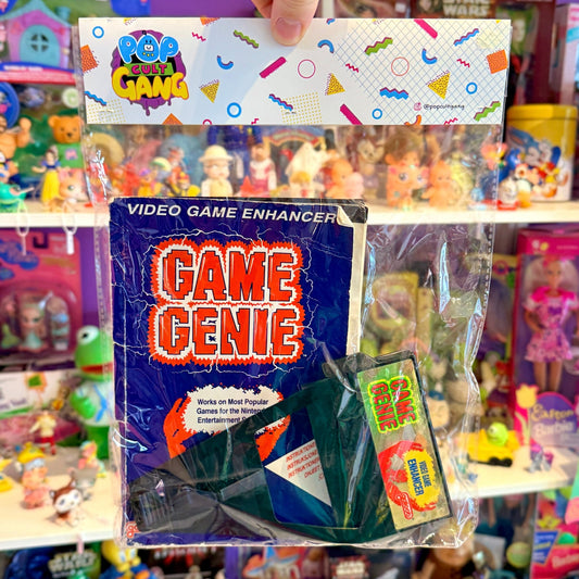 Nintendo NES: Game Genie + Book (80s) - PopCultGang