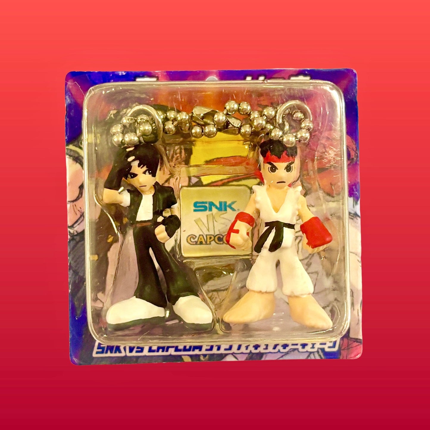 SNK vs. Capcom: The King of Fighter Twin Figure Keychain Set Kyo Kusanagi & Ryu (Capcom, 1999) - PopCultGang