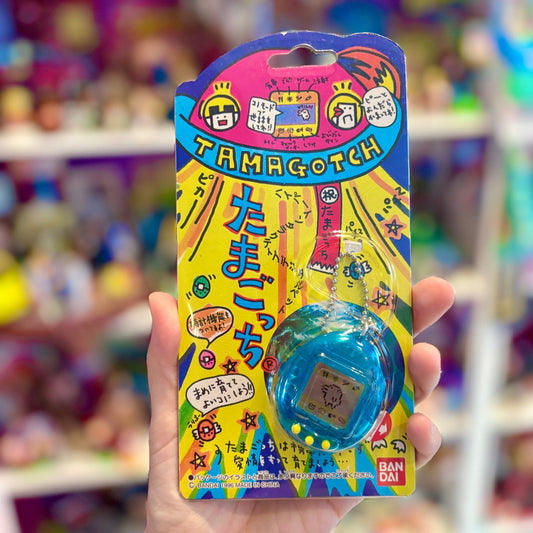 Tamagotchi Gen 1 - Clear Blue Shell Japanese (MOC, 1996, Bandai) - PopCultGang
